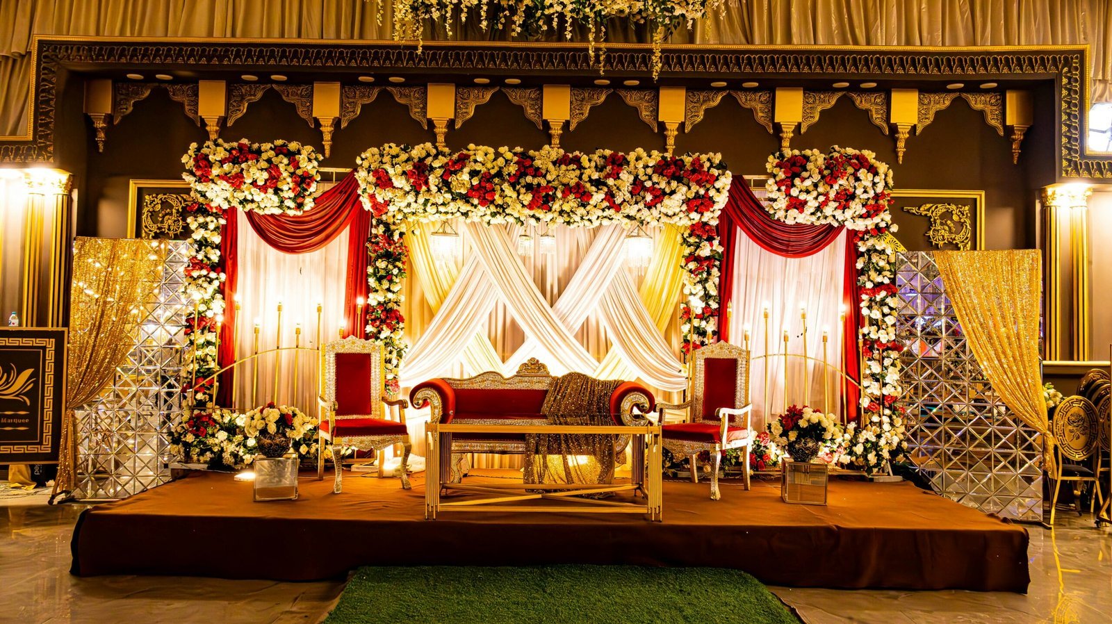 A beautifully decorated stage is ready for a celebration.